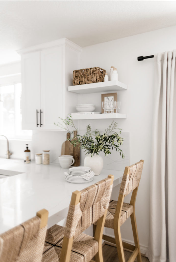 Kitchen Stool Roundup - Halfway Wholeistic; Click here to see the kitchen stool roundup on Halfway Wholeistic! Counter stools are such an essential kitchen accessory because they add so much character and warmth to the space. Since our kitchen is all white, I opted for a stool with a warm wood tone to soften things up a bit. Stools for kitchen island with back wood. Stool design wooden modern. Stools for living room extra seating. Kitchen stools with backs modern. Stools in front of fireplace.
