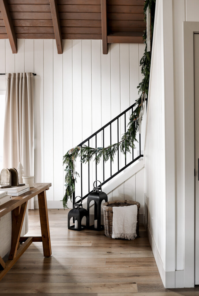 Garland Hanging Hack: How to Hang Garland on Your Staircase Without Hassle or Damage
