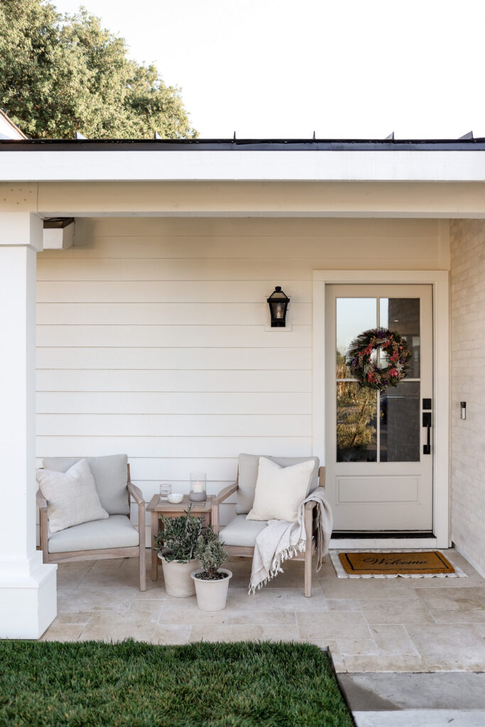 Cozy Spring Front Porch Makeover with Earthy Touches and Floral Charm